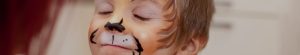 gros plan enfant maquillage lion